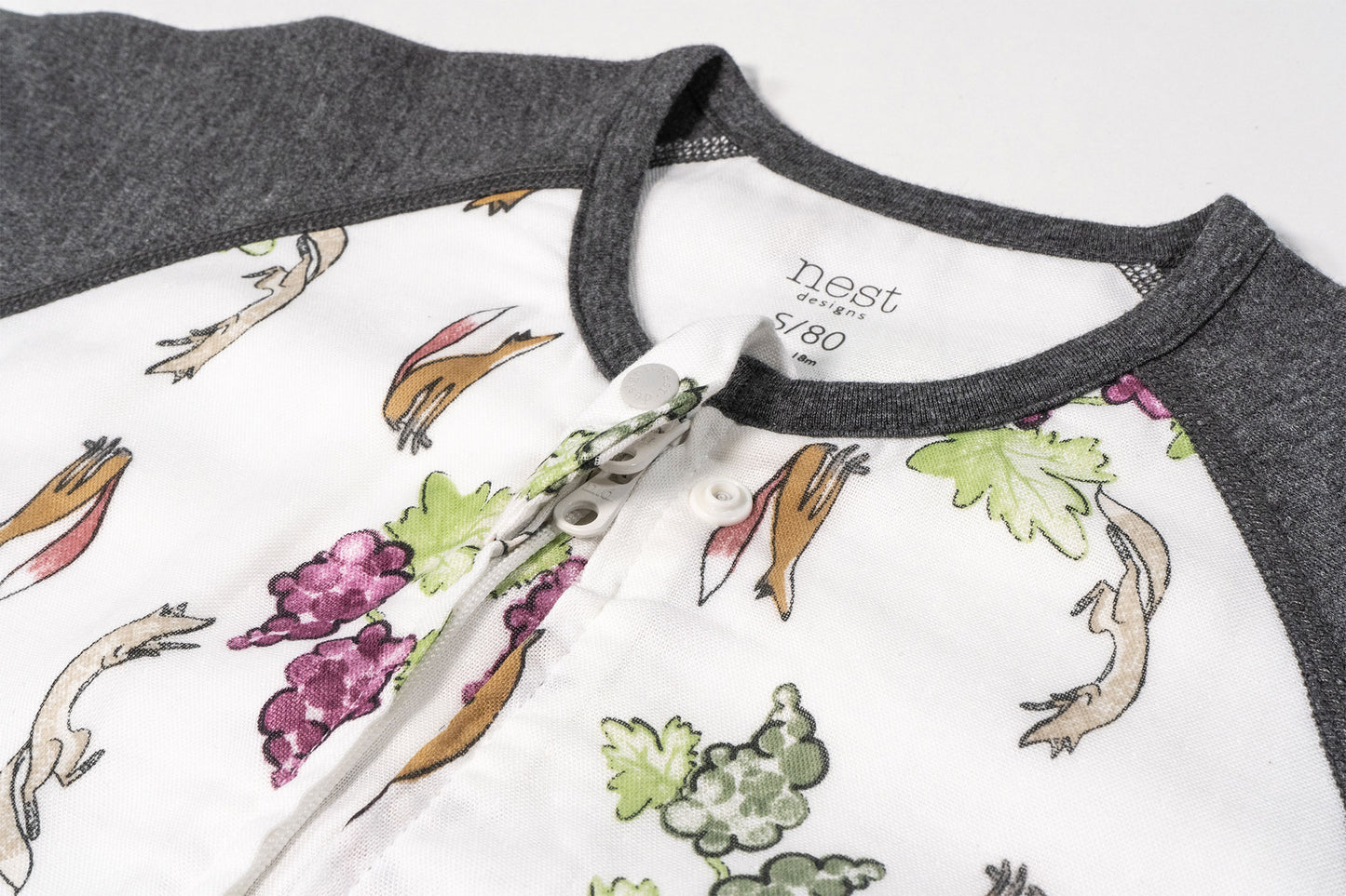 Load image into Gallery viewer, Raglan Short Sleeve Footed Sleep Bag 0.6 TOG (Bamboo Pima) - The Fox &amp;amp; The Grapes
