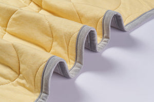 Small Bamboo Jersey Cozy Blanket 2.0 TOG - Pantone Sunset Gold